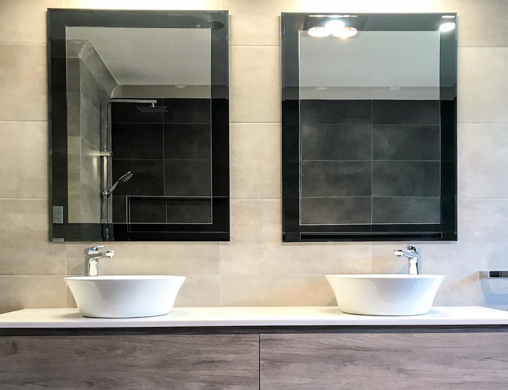 Double mirrors with double bowl wall hung vanity