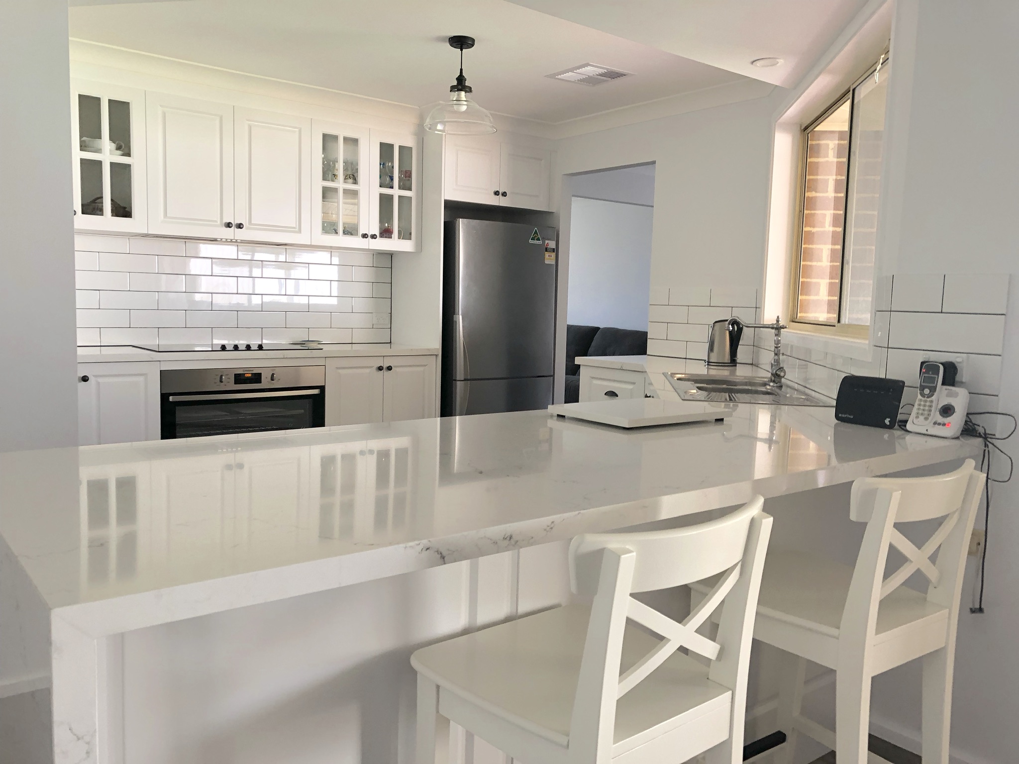 Timeless white Hamptons style kitchen - kitchen renovation by Master Bathrooms & Kitchens