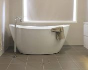 Stunning free standing bath with floor mounted bath filler - bathroom renovation by Master Bathrooms & Kitchens.