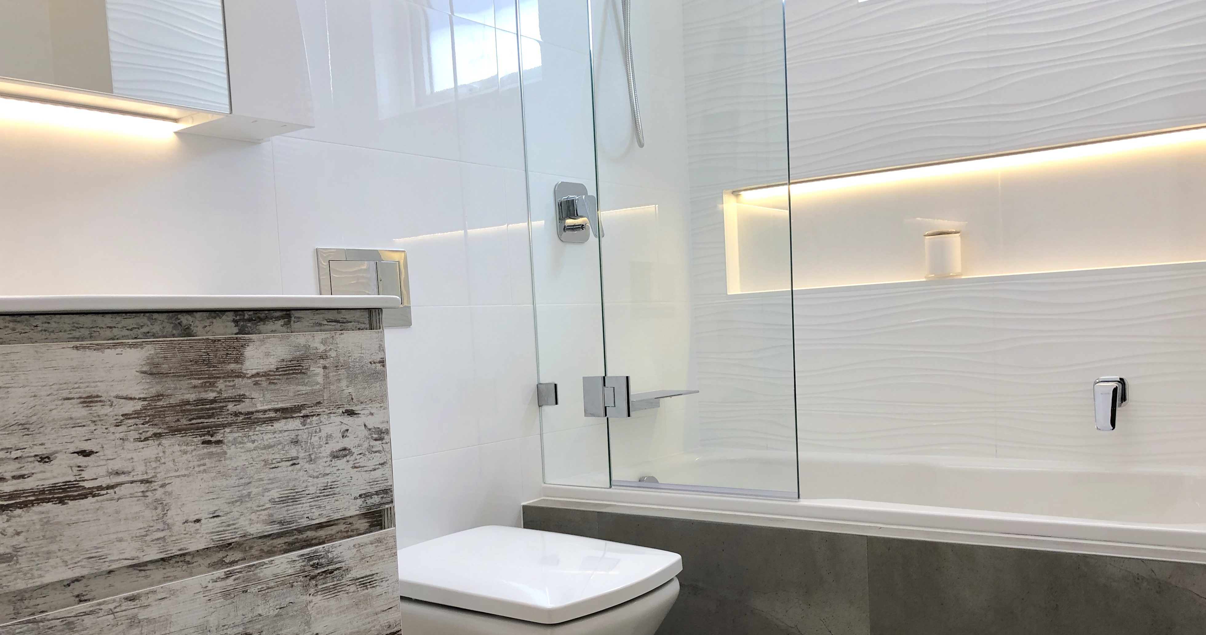 Stunning shower bath combination - bathroom renovation by Master Bathrooms & Kitchens