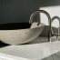 Stone sink paired with custom vanity