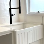 Laundry renovation with farmhouse sink
